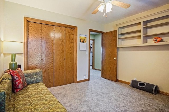 bedroom with carpet flooring, ceiling fan, and a closet