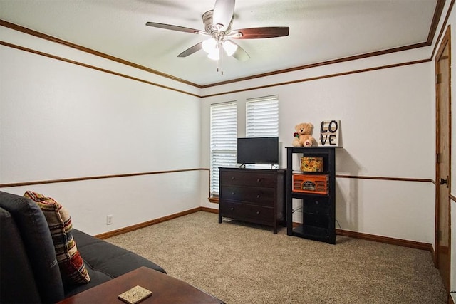 interior space featuring crown molding, carpet floors, and ceiling fan