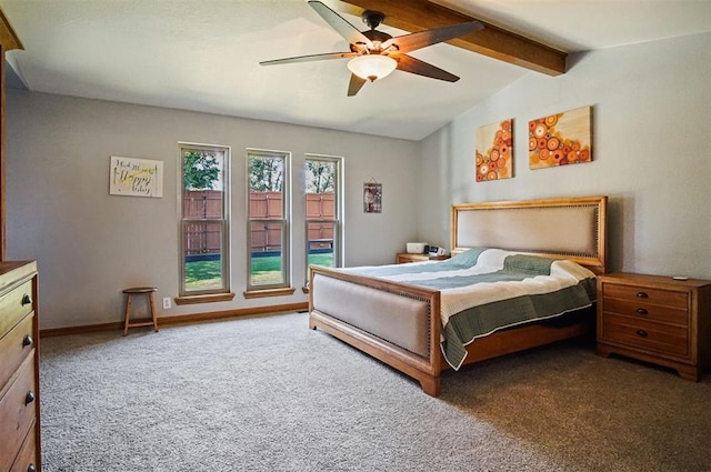 carpeted bedroom featuring lofted ceiling with beams and ceiling fan