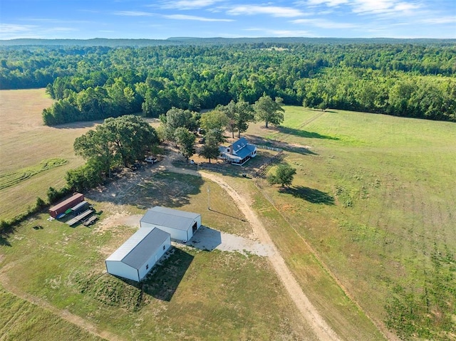 birds eye view of property with a rural view