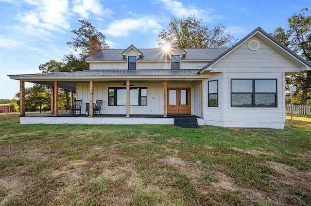 view of front of home featuring a porch and a front yard