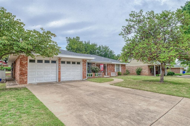 single story home featuring a front yard and a garage