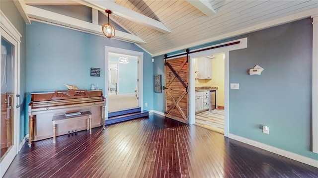 misc room with a barn door, wooden ceiling, wood-type flooring, and vaulted ceiling with beams