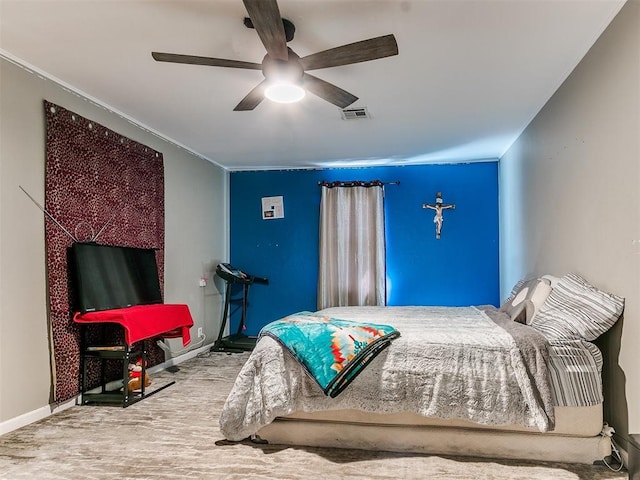 bedroom with hardwood / wood-style floors and ceiling fan