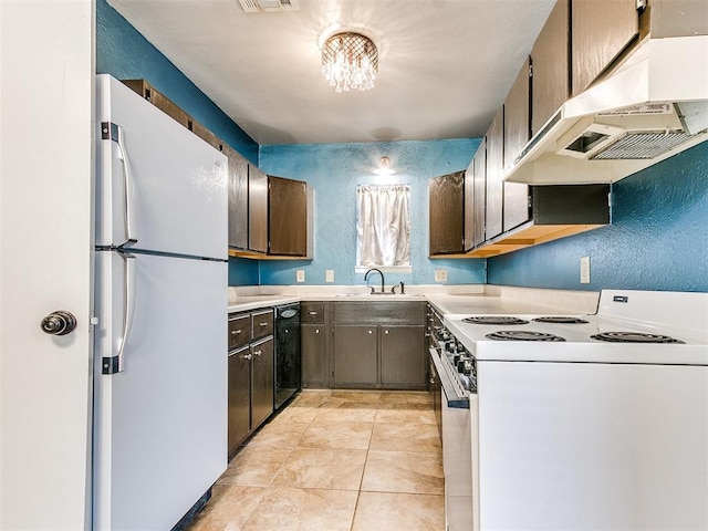 kitchen featuring white appliances, dark brown cabinetry, a notable chandelier, and sink