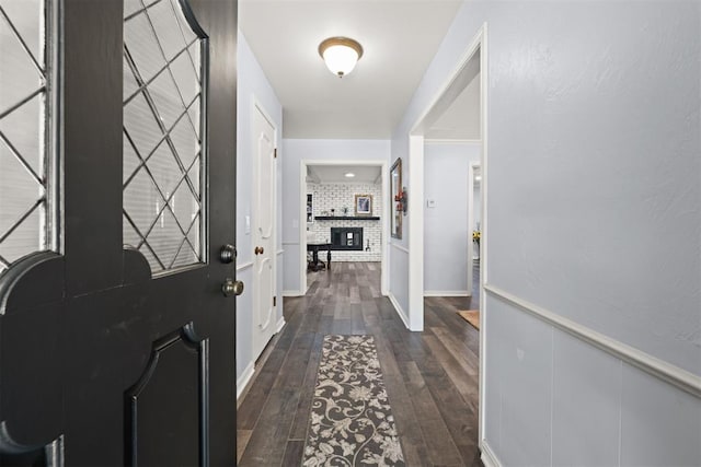 entryway featuring dark wood-type flooring