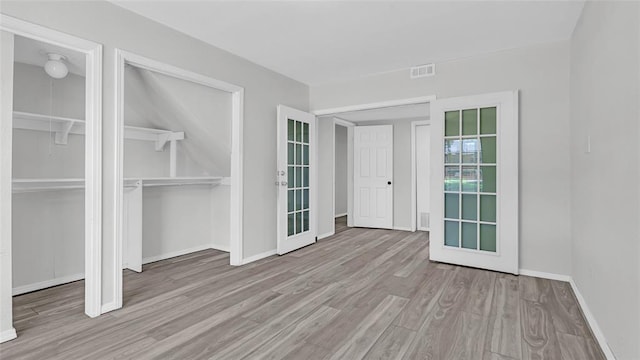 interior space with light hardwood / wood-style floors