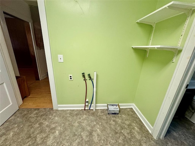 laundry room with washer hookup and wood-type flooring