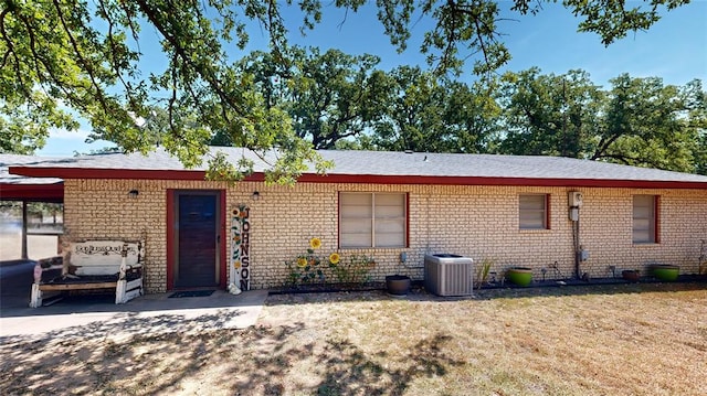 view of front of home featuring central AC unit