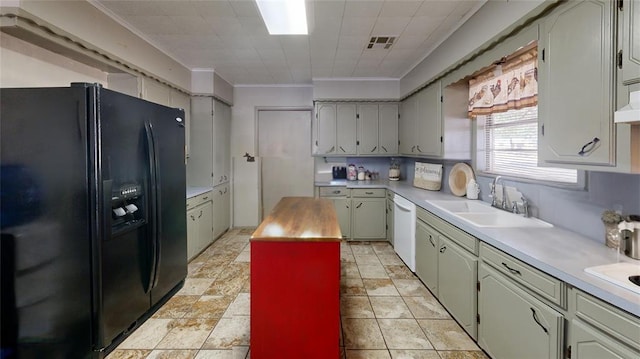 kitchen with butcher block counters, sink, dishwasher, black refrigerator with ice dispenser, and ornamental molding