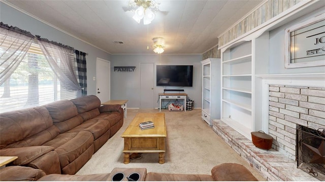 living room with ceiling fan, carpet floors, ornamental molding, and a brick fireplace