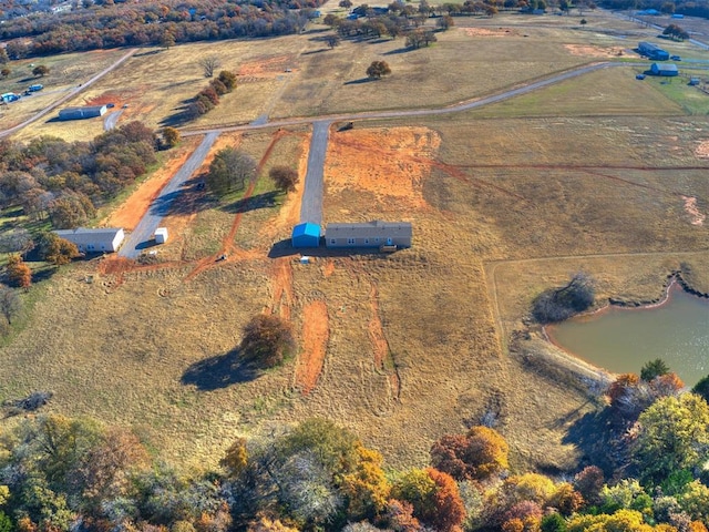 aerial view featuring a water view and a rural view