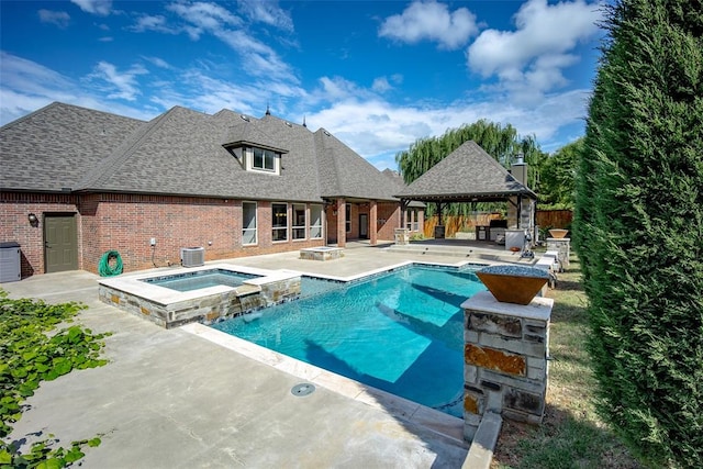 view of swimming pool featuring a gazebo, cooling unit, an in ground hot tub, and a patio