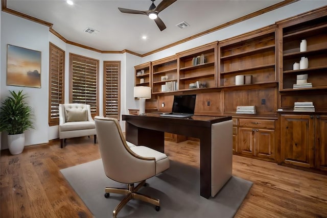 office space with ceiling fan, light wood-type flooring, and crown molding