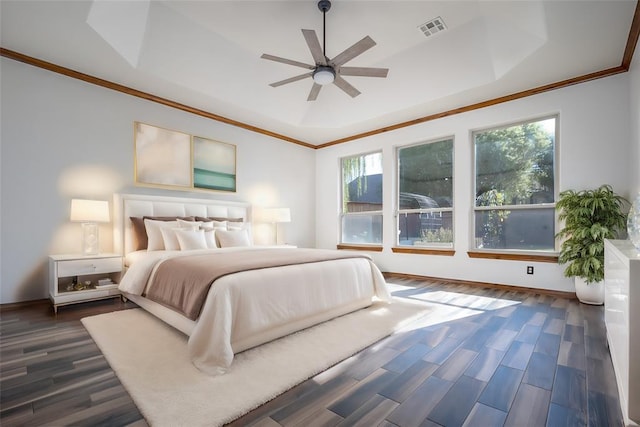 bedroom with ceiling fan, ornamental molding, dark wood-type flooring, and multiple windows