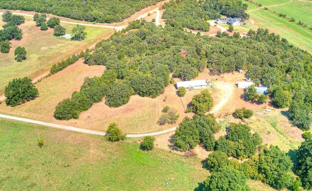 birds eye view of property featuring a rural view