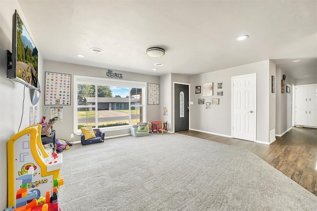 208 S Mockingbird Dr, Altus, OK 73521 - game room with wood finished floors, baseboards, and recessed lighting