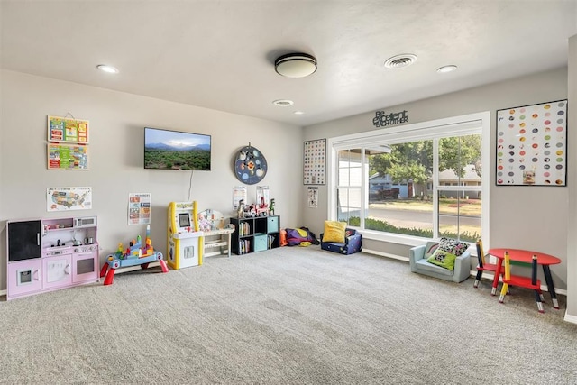208 S Mockingbird Dr, Altus, OK 73521 - recreation room featuring carpet flooring, recessed lighting, and baseboards