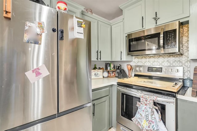 208 S Mockingbird Dr, Altus, OK 73521 - kitchen featuring appliances with stainless steel finishes and light countertops