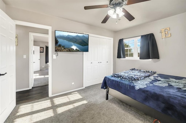 208 S Mockingbird Dr, Altus, OK 73521 - carpeted bedroom featuring a closet, baseboards, and ceiling fan