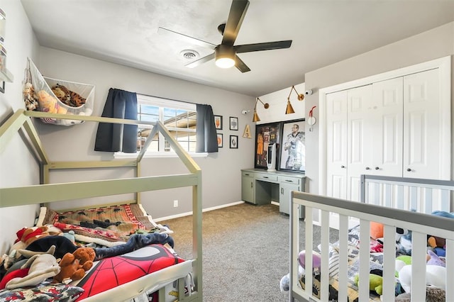 208 S Mockingbird Dr, Altus, OK 73521 - carpeted bedroom with baseboards, a closet, and ceiling fan