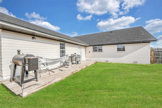 208 S Mockingbird Dr, Altus, OK 73521 - rear view of property featuring roof with shingles, a wooden deck, brick siding, and crawl space