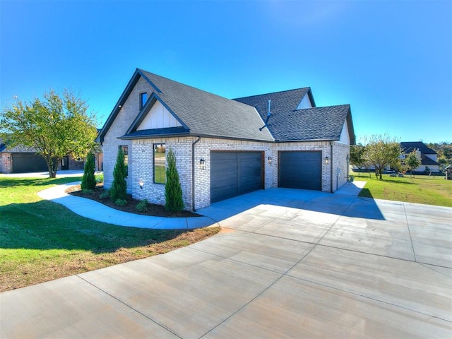 view of property exterior with a yard and a garage