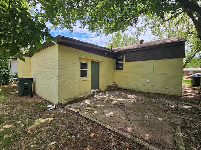 rear view of house featuring a patio area