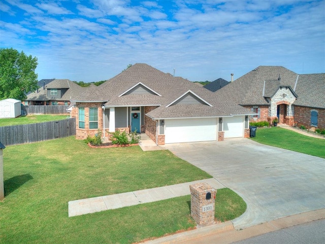 view of front facade featuring a garage and a front lawn