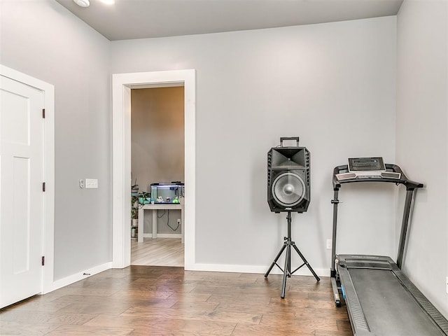 1301 Atalon Dr, Moore, OK 73160 - workout room with wood finished floors and baseboards