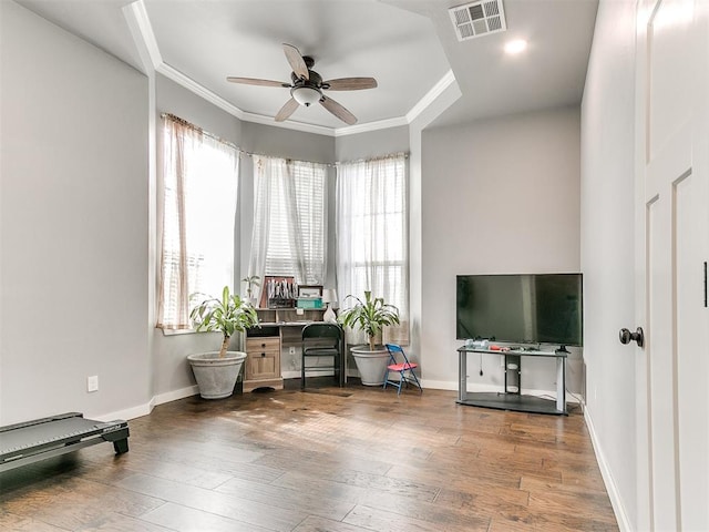 1301 Atalon Dr, Moore, OK 73160 - home office featuring ceiling fan, ornamental molding, and wood-type flooring