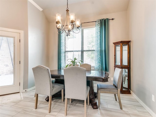 1301 Atalon Dr, Moore, OK 73160 - dining area with a chandelier and healthy amount of natural light