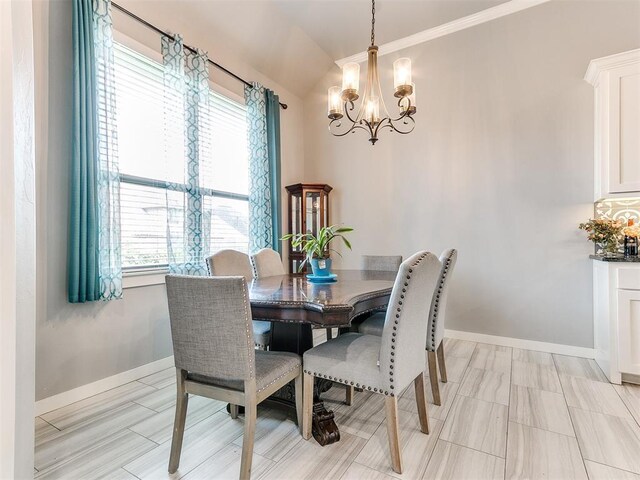 1301 Atalon Dr, Moore, OK 73160 - dining room with a chandelier and lofted ceiling