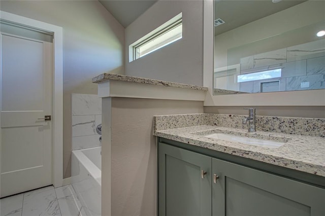 bathroom featuring shower / bath combination, vanity, and lofted ceiling