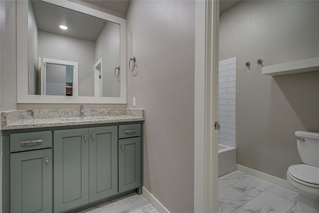 full bathroom with vanity, tub / shower combination, and toilet