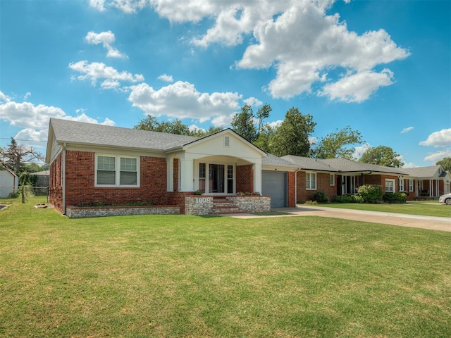 ranch-style house with a garage and a front lawn