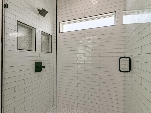 bathroom featuring walk in shower