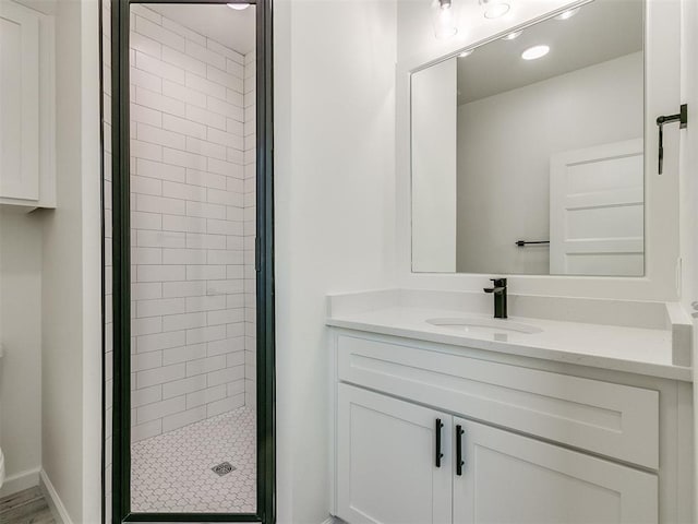 bathroom featuring vanity and walk in shower