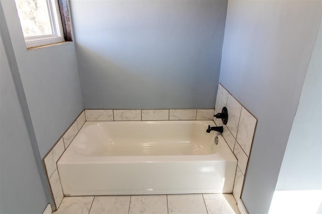 bathroom featuring a tub