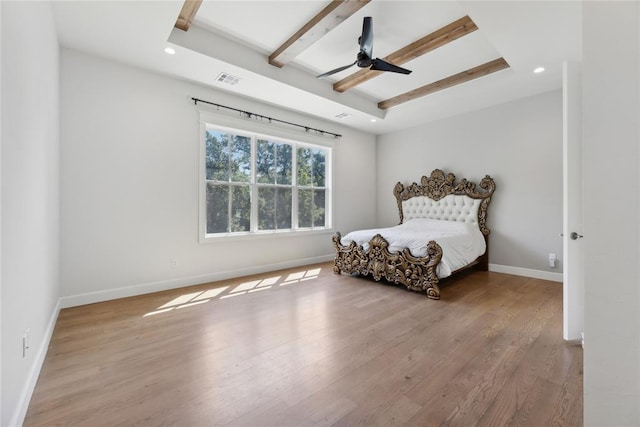 bedroom with ceiling fan and light hardwood / wood-style flooring