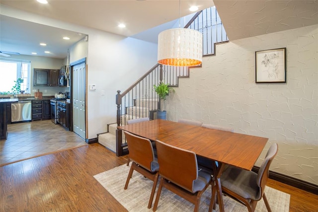 dining area with light wood-type flooring