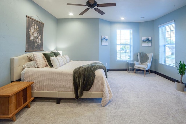 carpeted bedroom with ceiling fan