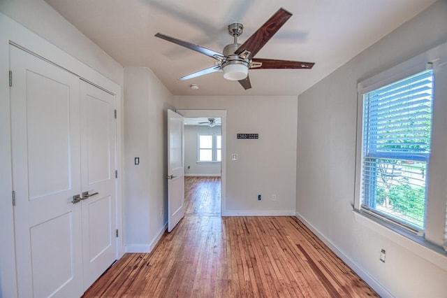 spare room featuring light wood-type flooring