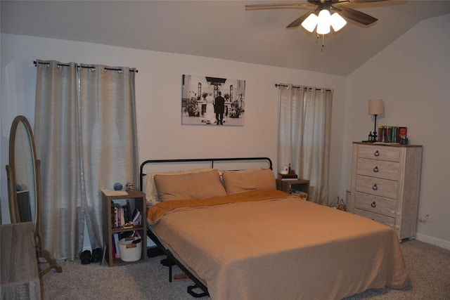 bedroom with carpet flooring, ceiling fan, and lofted ceiling