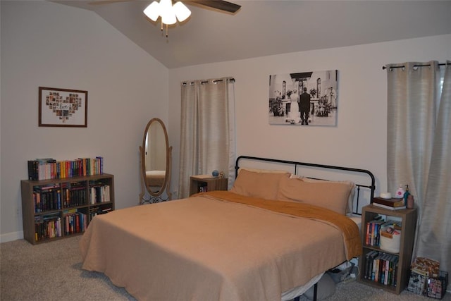 carpeted bedroom with ceiling fan and lofted ceiling