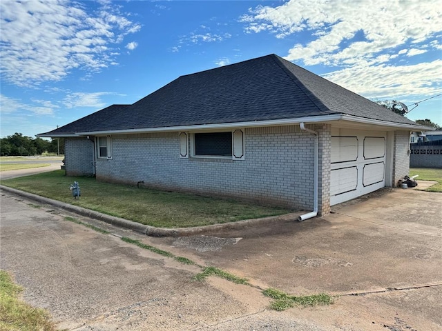 view of home's exterior with a garage