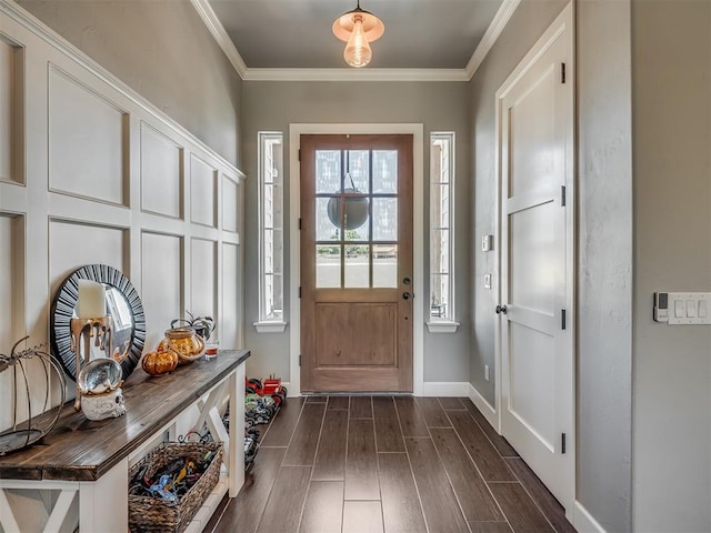 interior space featuring dark hardwood / wood-style floors and crown molding