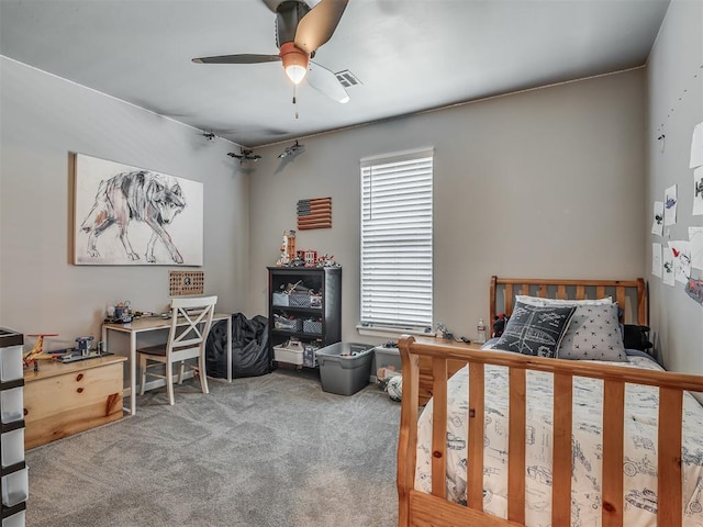 carpeted bedroom with ceiling fan