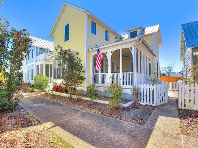 view of front of home with a sunroom