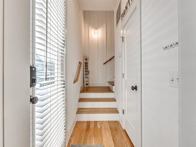 stairs with wood-type flooring